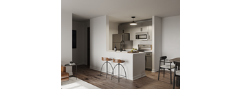 a kitchen and dining area in a 555 waverly unit