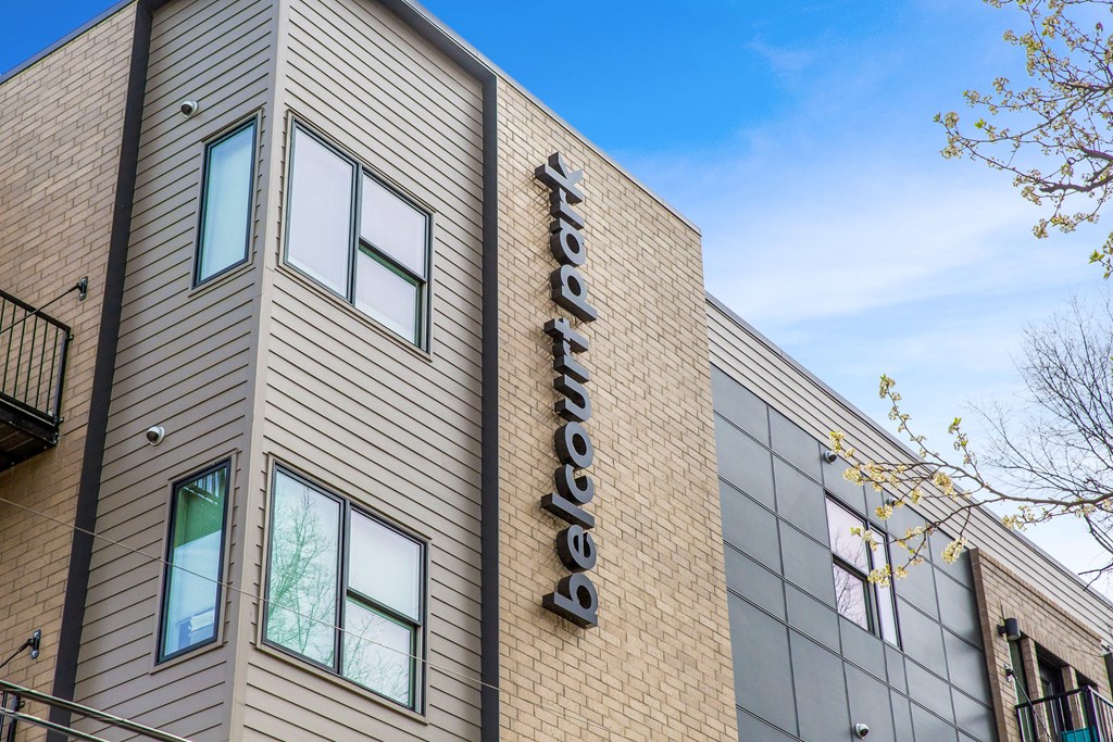 the side of a building with a sign on it