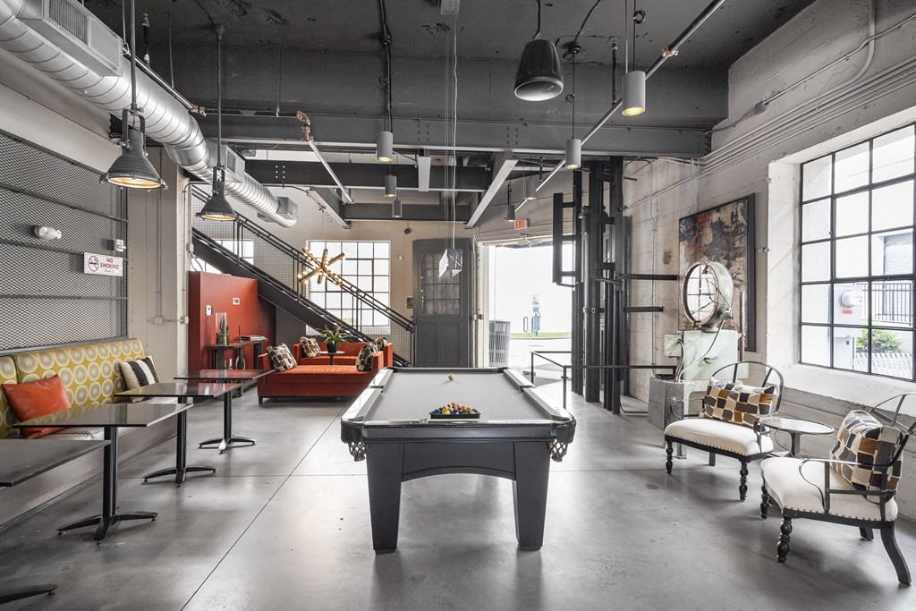 a pool table in the middle of a room