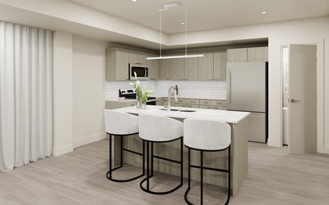 A modern kitchen with a bar stool and a countertop.