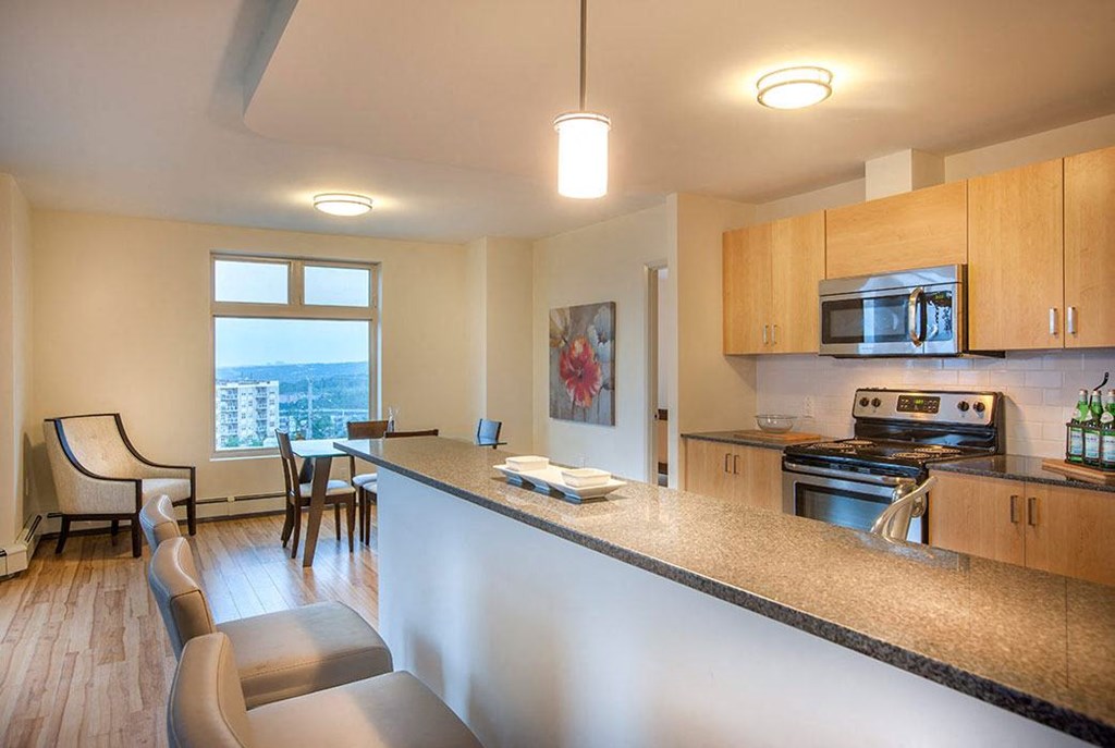 a kitchen with a counter top and a sink