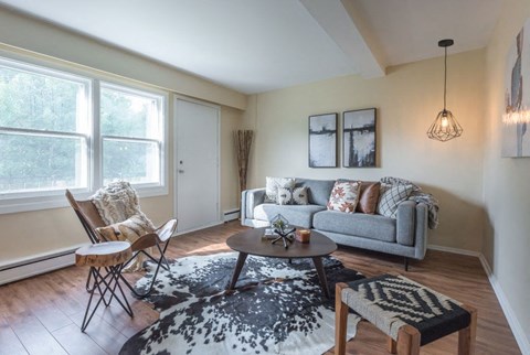 a living room with a couch and a table