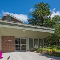 the front of a building with a driveway