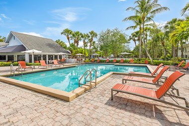 Resort style pool with large sundeck with plenty of lounge areas