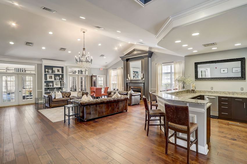 a large living room with a kitchen and a dining room - Photo Gallery