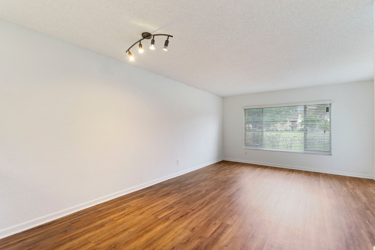 Bedroom with recessed lighting and window