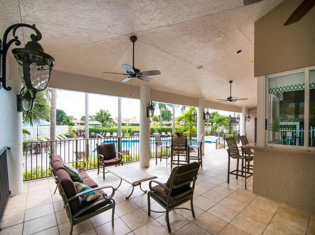 a living room with furniture and a pool