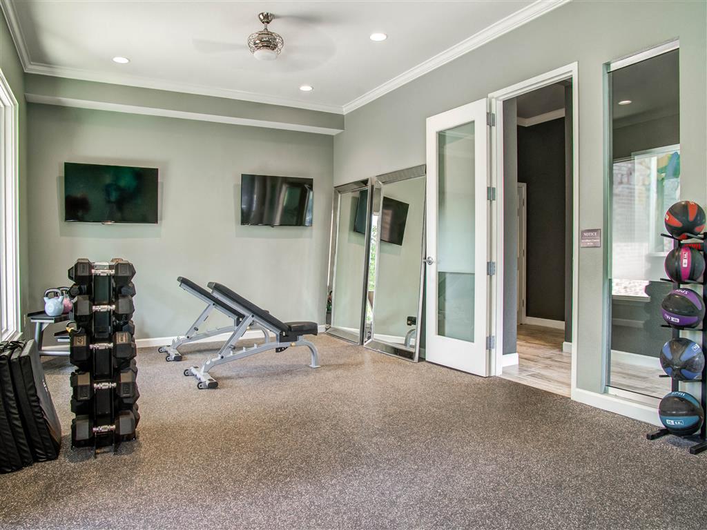 Harpeth River Oaks Fitness Center with Free Weights, TVs, and Medicine Balls