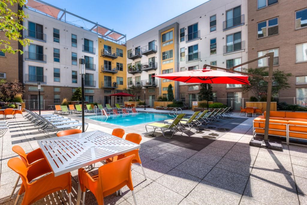 our apartments have a large pool and lounge chairs