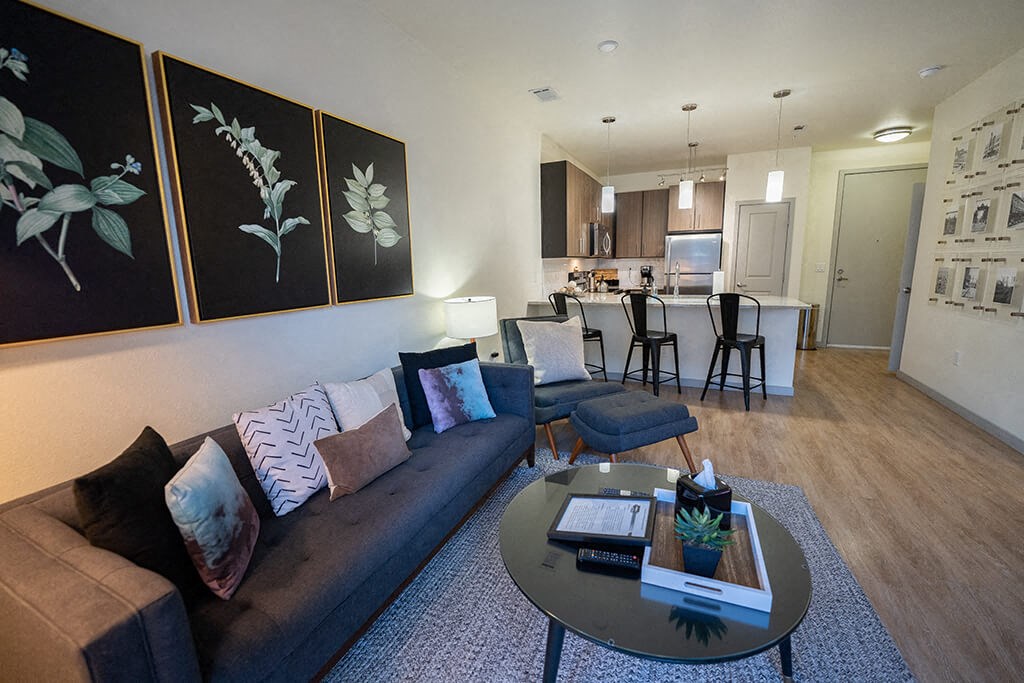 a living room with a couch and a table