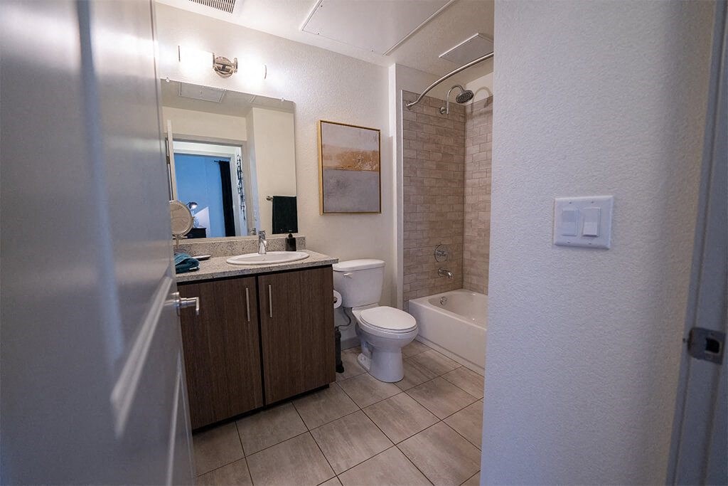 a bathroom with a toilet and a sink
