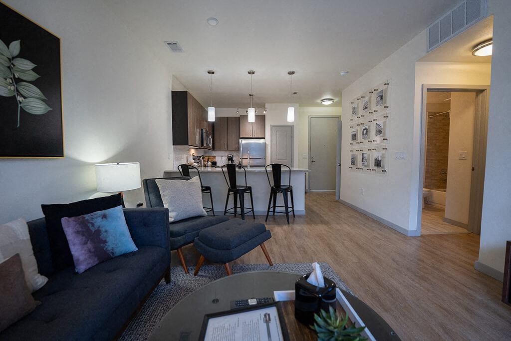 a living room with a dining room and a kitchen