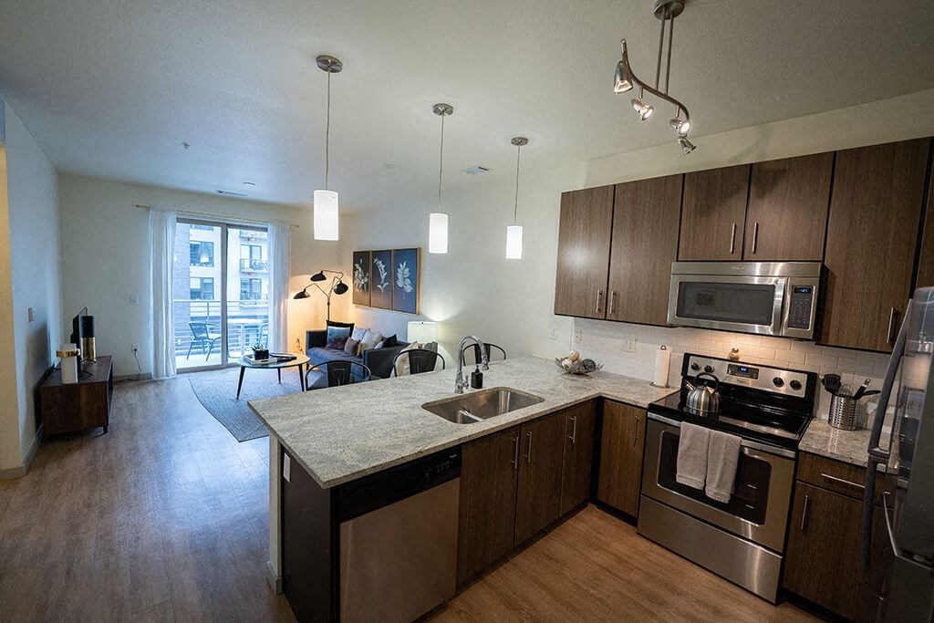 a kitchen with a sink and a counter top