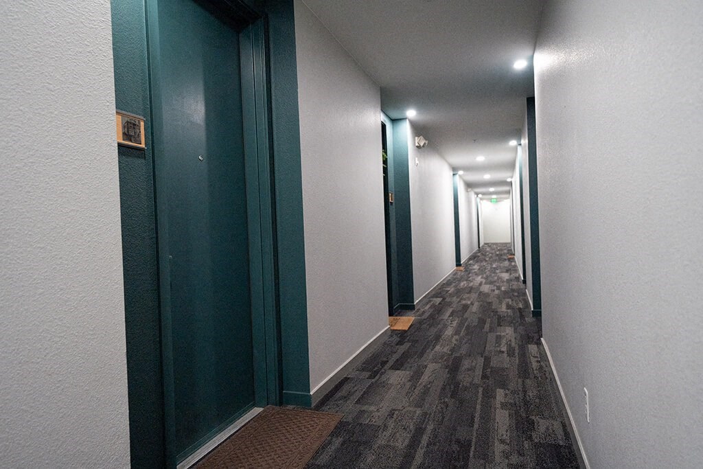 a row of mirrors on a wall in a room