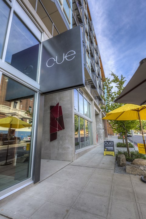 Cue entrance with building sign