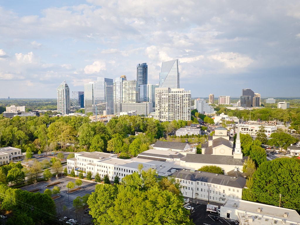 an aerial view of the city with skyscrapers in the background