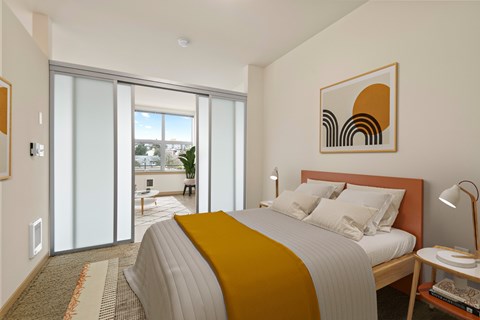 A bedroom with a bed, nightstand, and a painting on the wall.