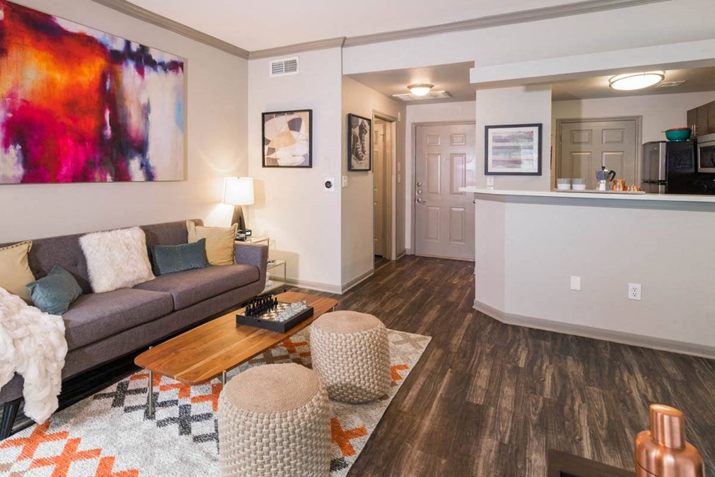 a living room with a couch and a table