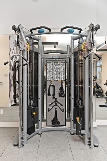 A gym machine with a grey and black color scheme.