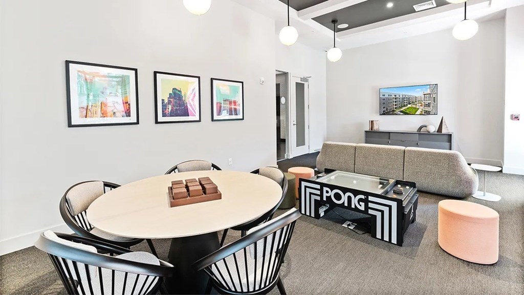 A conference room with a Pong table in the middle.
