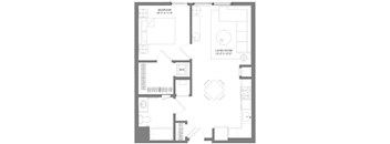 A floor plan of a small apartment with a bedroom, living room, and a workspace.