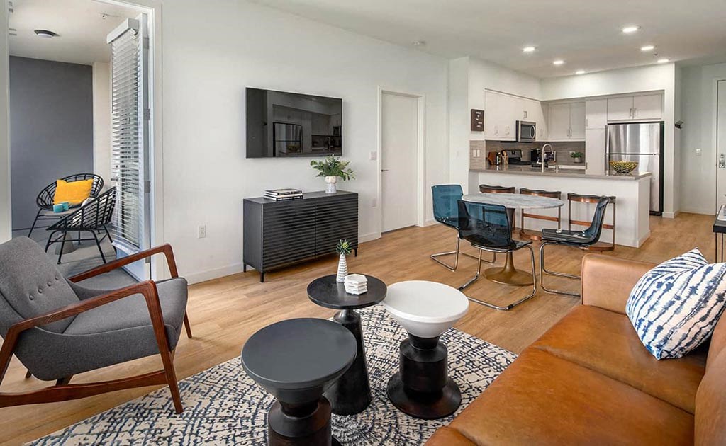 a living room with a couch and a table