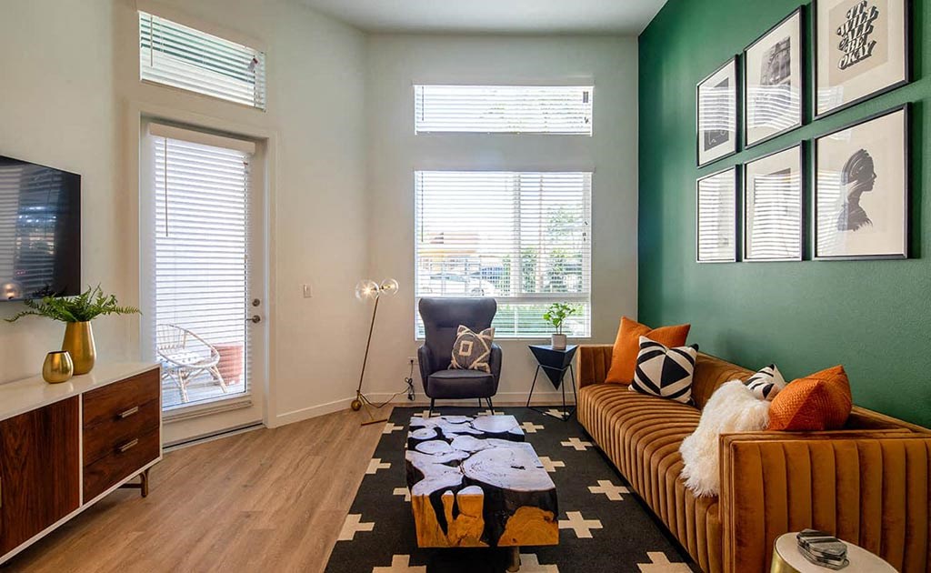 a living room with a couch and a tv