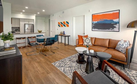 a living room with a couch and a table