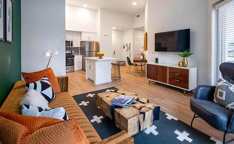 a living room with a couch and a television