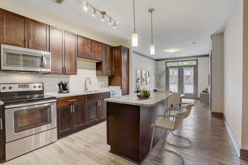 Nashville Apartments - Octave Apartments - Luxury Kitchen with gourmet Island countertop and stainless steel appliances