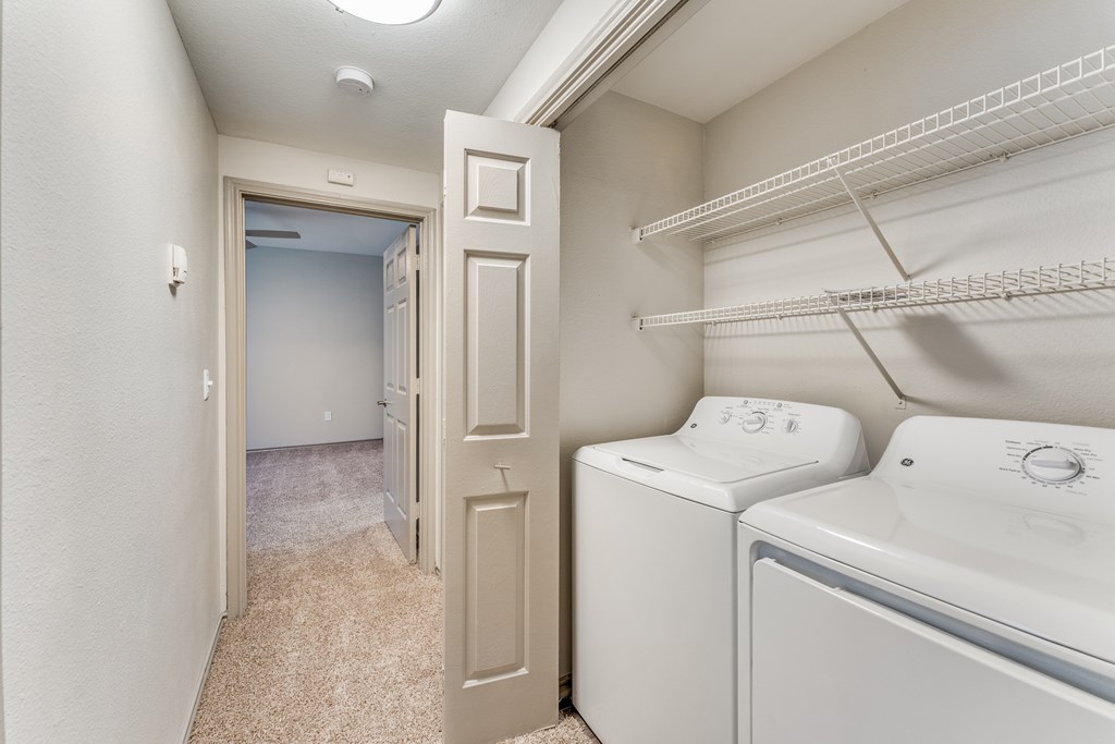 A laundry room with a washer and dryer.
