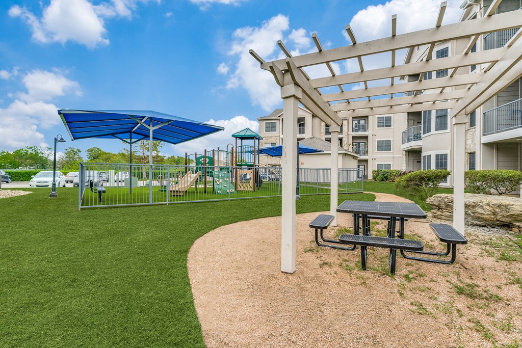the preserve at ballantyne commons park with picnic table and playground