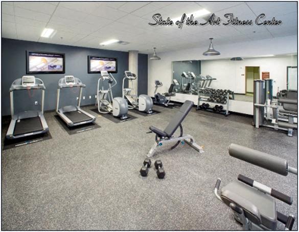 Apartments for Rent in Green Lake Seattle WA - Circa Green Lake - Fitness Center with Cardio Equipment and Weight Training Equipment.
