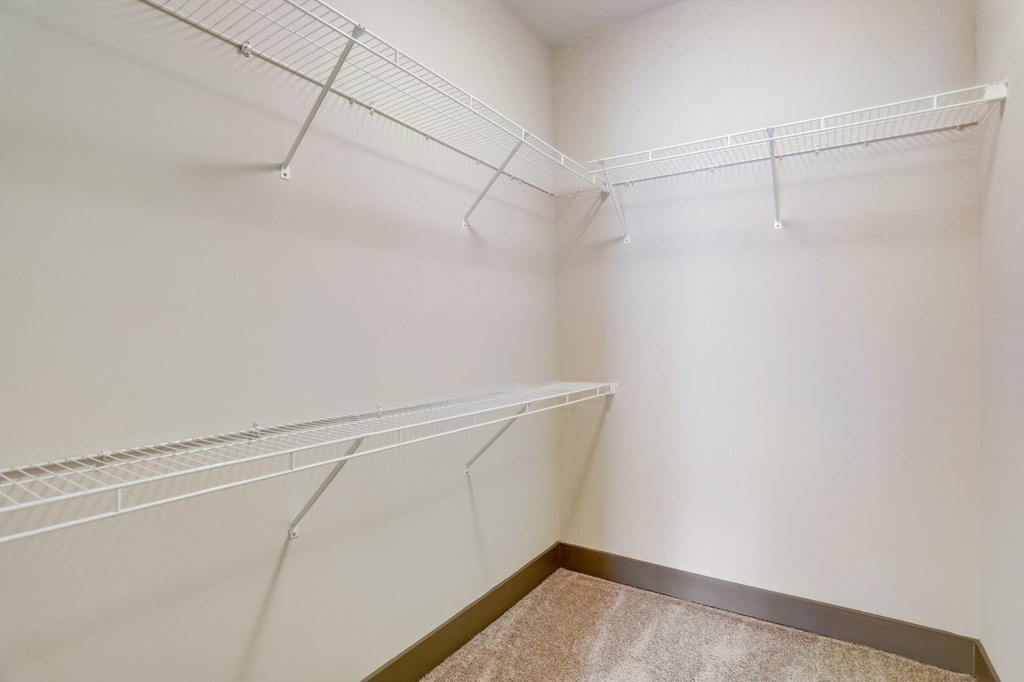 Pet-Friendly Apartments in Nashville, TN- Octave Apartments- large walk in closet with built in shelves