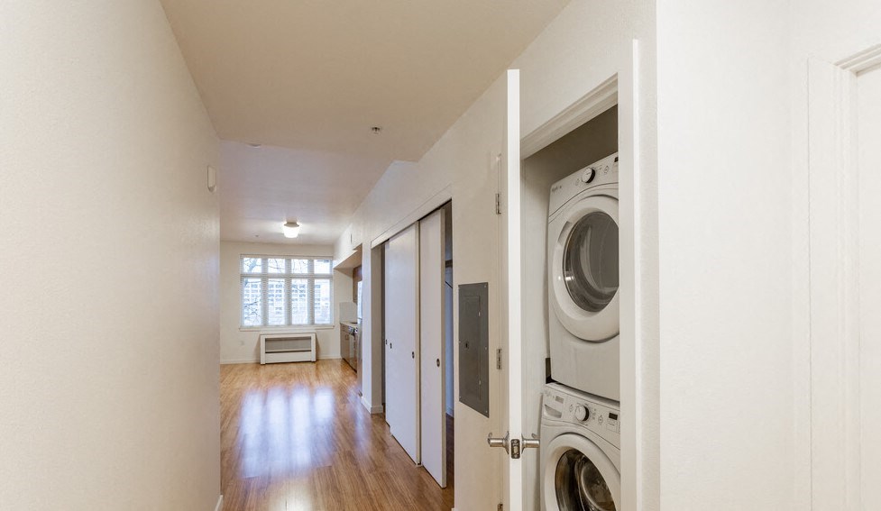 a laundry room with a washer and dryer