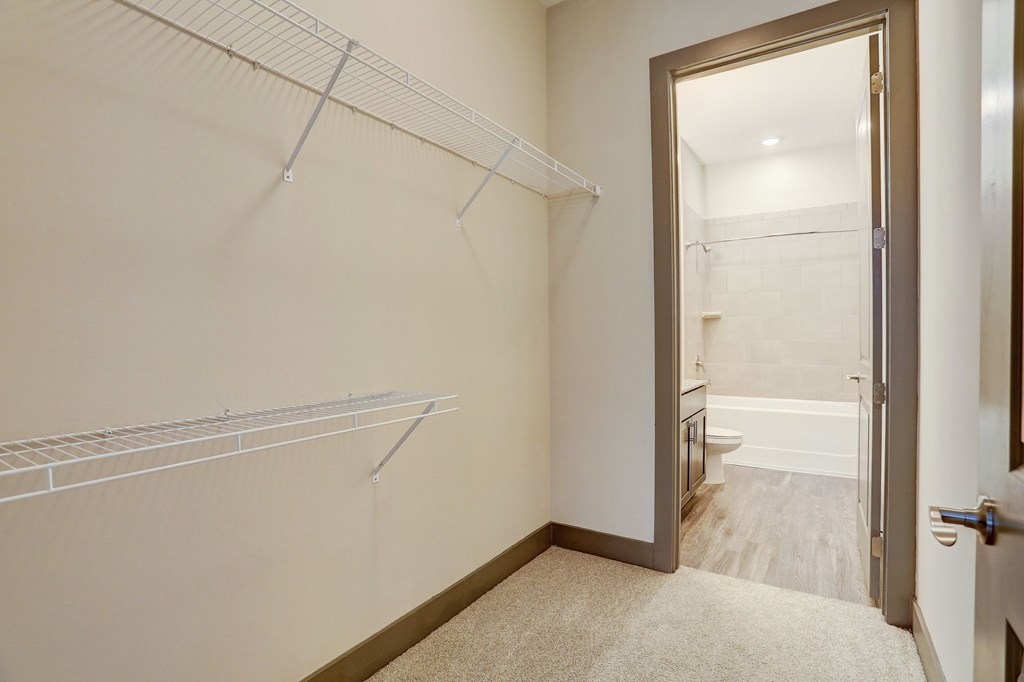 Pet-Friendly Apartments in Nashville, TN- Octave Apartments- large walk in closet with built in racks