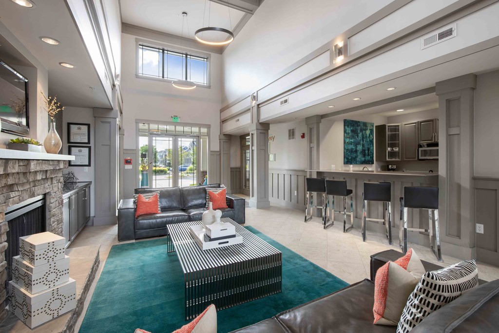 clubroom with fireplace and seating areas