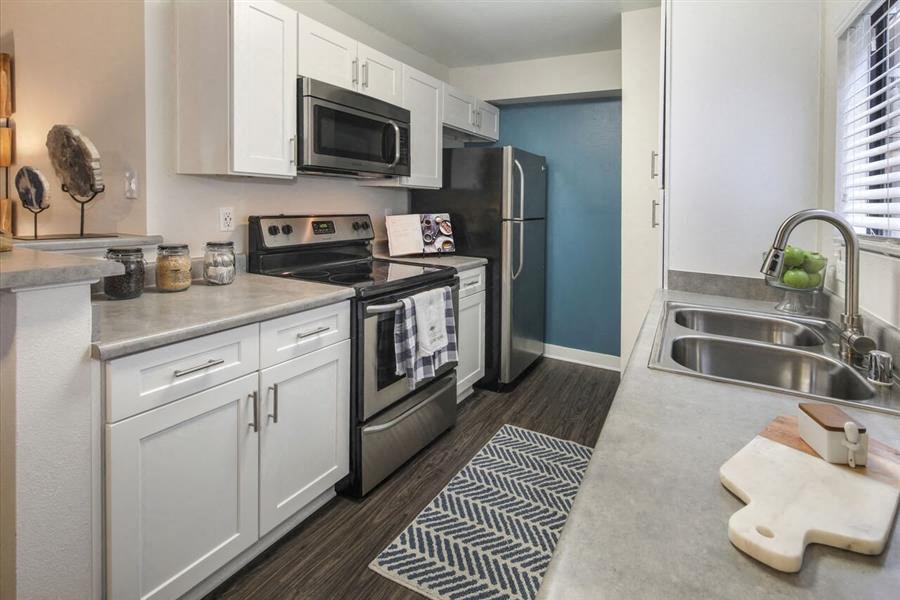 updated kitchen with stainless steel appliances