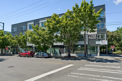 A street view with a building number 7600.