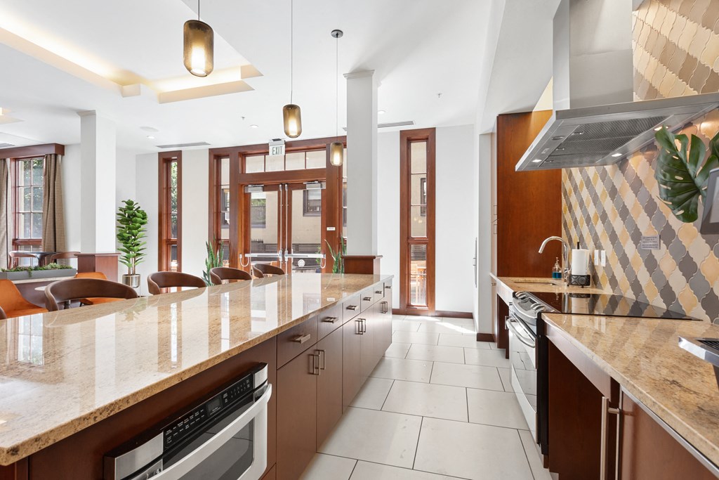 a large kitchen with an island and a counter top