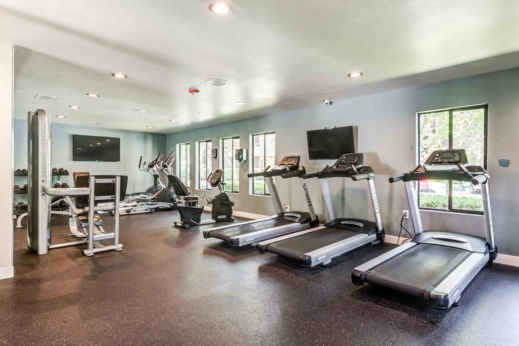 fitness center with treadmills