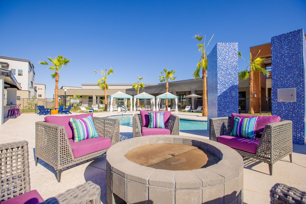 1 Bedroom Apartments in Gilbert AZ - Curve At Gilbert - Outdoor Lounge With Cozy Patio Furniture, A Fire Pit, And A Pool