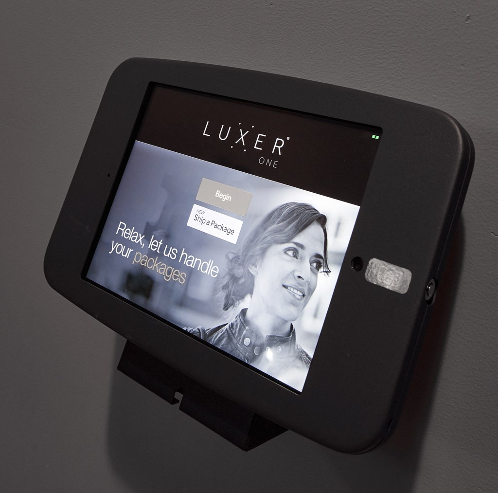 a tablet screen with a picture of a woman on it