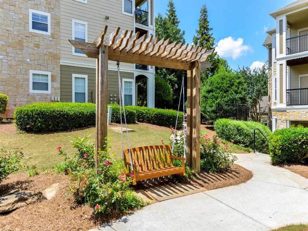 The Ascent at Windward apartments in Alpharetta Georgia photo of outdoor swing