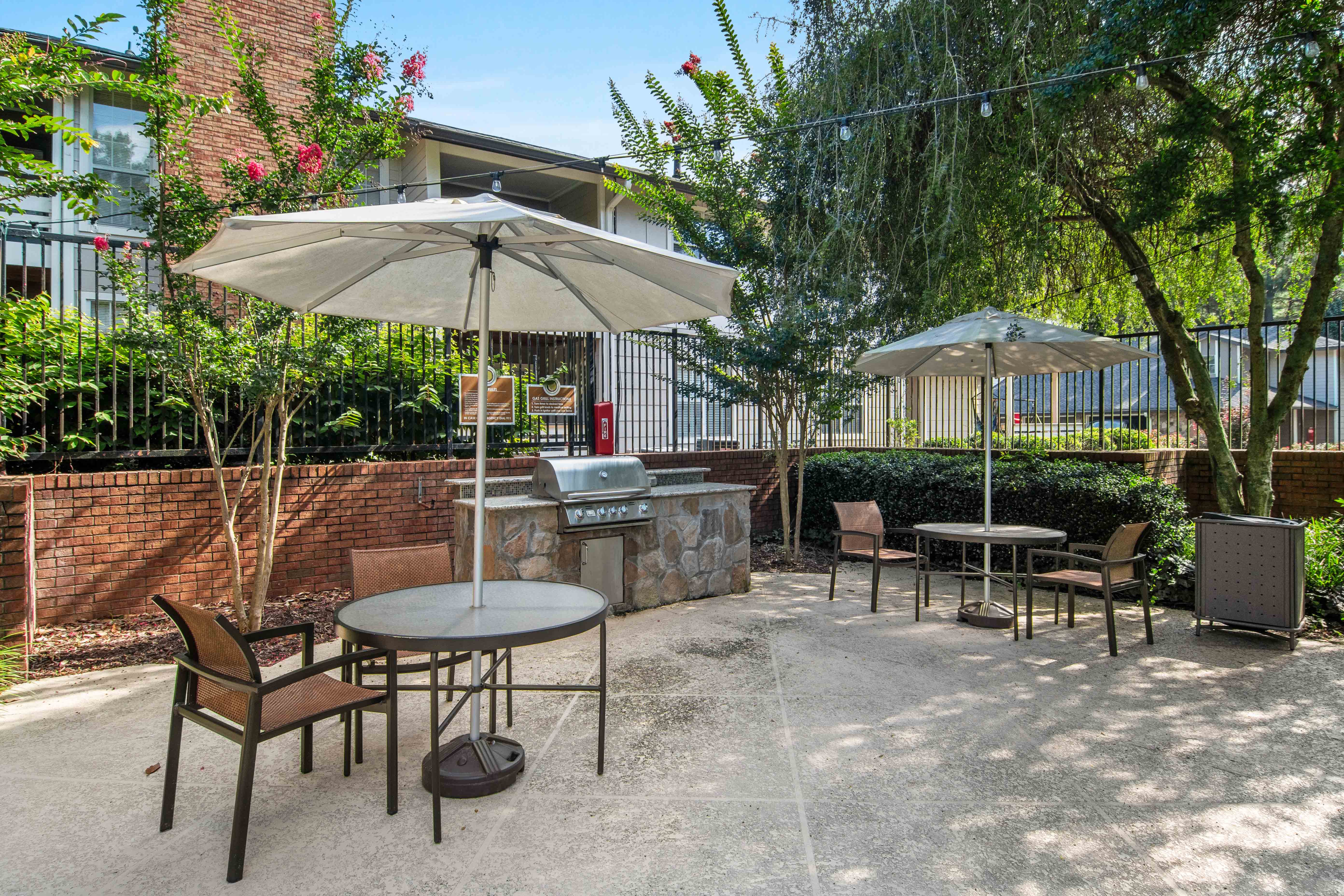 Glen Lake Apartments in Atlanta, GA 30328 photo of a bbq and picnic tables