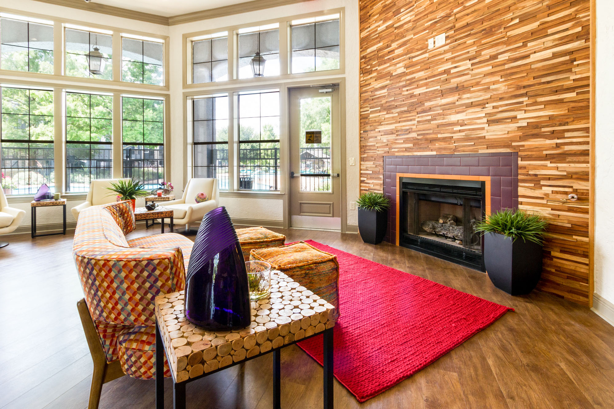 resident clubhouse with an internet café and cozy fireplace