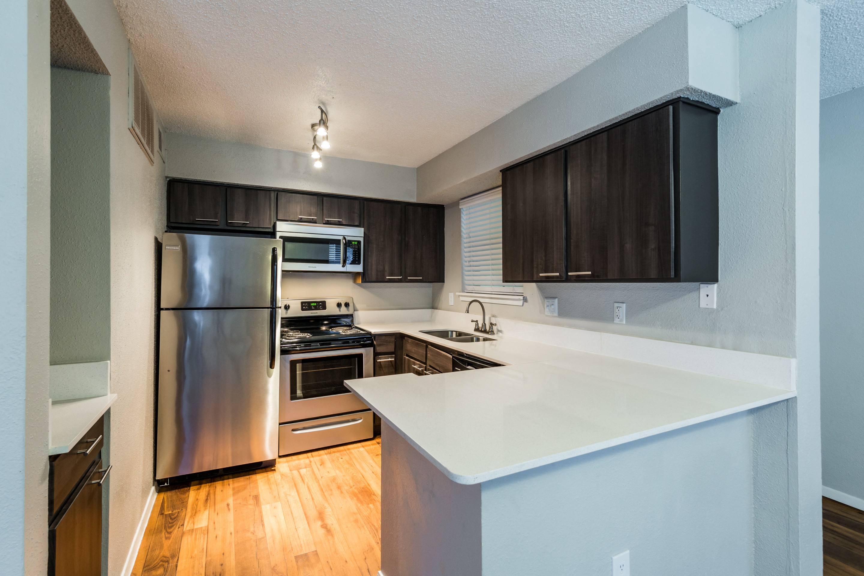 updated kitchen with stainless steel appliances
