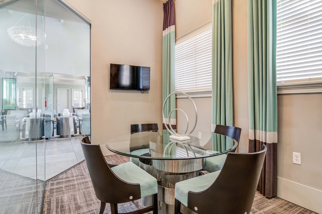 Pet-Friendly Apartments in Woodstock, GA – Lea Woodstock – clubhouse seating area with TV