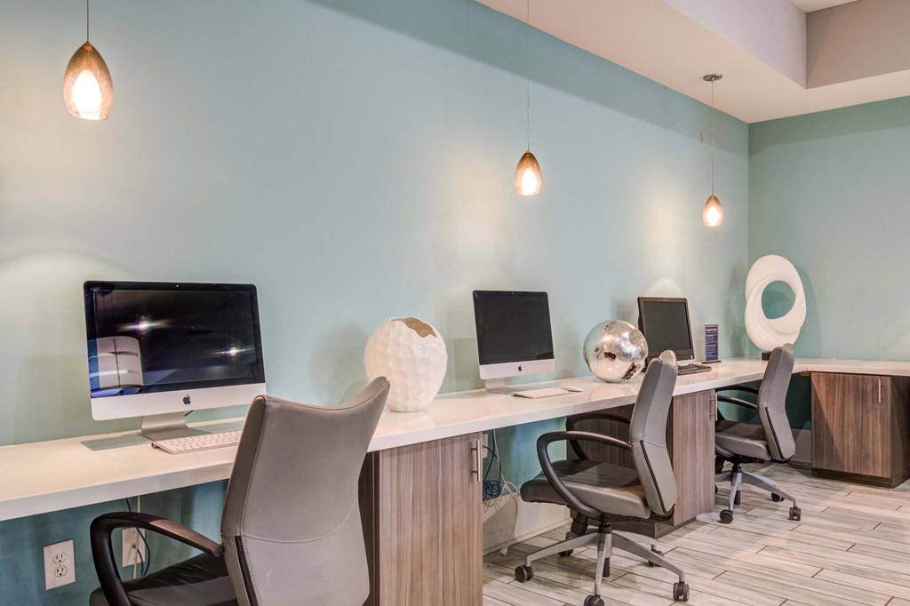 Woodstock, GA Apartments – Lea Woodstock – business center with multiple computers.