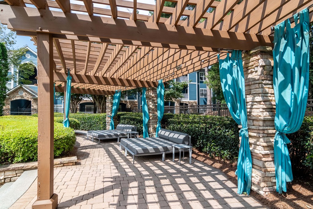 Pet-Friendly Apartments in Woodstock, GA – Lea Woodstock – Sundeck pergola with day beds